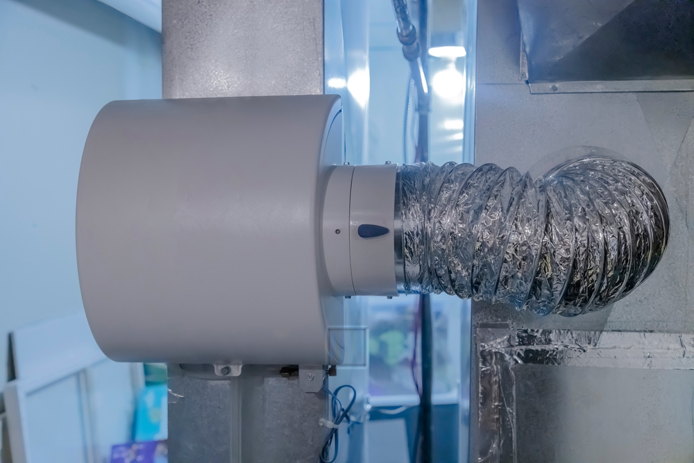 Whole home humidifier attached to an HVAC